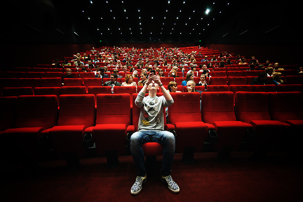 Inside movie theater risky photo